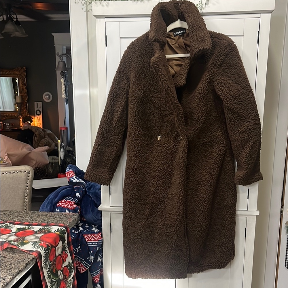 Teddy Coat the pockets are there but need to be opened up by cutting thread